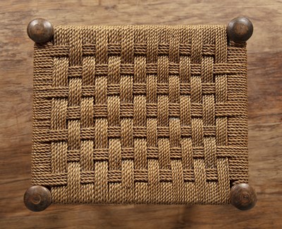 Lot 28 - Cotswold School two stools with raffia strung...