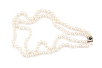 Lot 240 - A cultured pearl necklace with gem set clasp,...