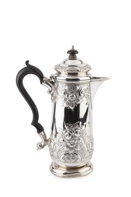 Lot 702 - An Edwardian silver hot water pot, embossed...