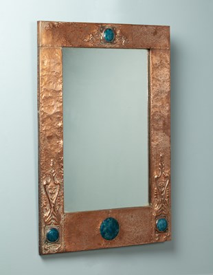 Lot 665 - An Arts & Crafts style wall mirror