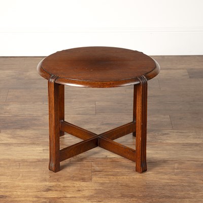 Lot 46 - In the manner of Heals oak, circular topped...