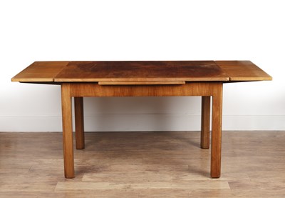 Lot 70 - Heals walnut, draw leaf dining table, with...