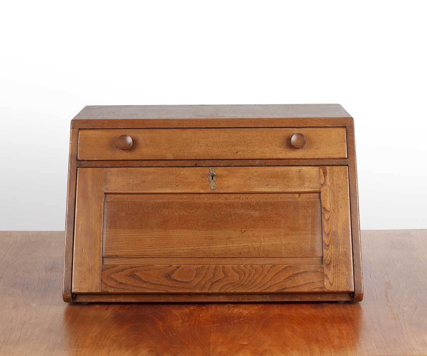 Lot 41 - Ercol elm, desktop or compact bureau, with a...