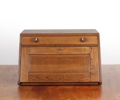 Lot 41 - Ercol  elm, desktop or compact bureau, with a...