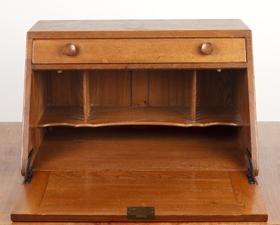 Lot 41 - Ercol elm, desktop or compact bureau, with a...