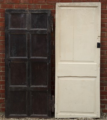 Lot 1378 - An oak eight-panelled door together with another