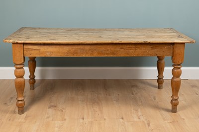 Lot 493 - A rustic pine kitchen table