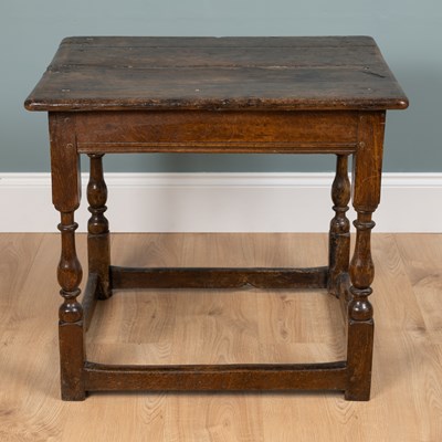 Lot 496 - An 18th century low oak joint table