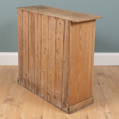 Lot 497 - A small pine two-door kitchen cupboard