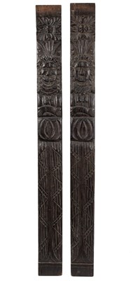 Lot 499 - A pair of antique carved oak terms