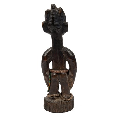 Lot 669 - A Yoruba female figure