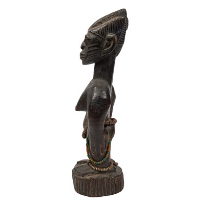 Lot 669 - A Yoruba female figure