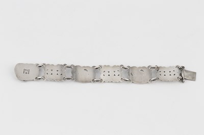 Lot 224 - A panel bracelet designed by Kristian...