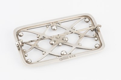 Lot 221 - A silver panel brooch designed by Harald...