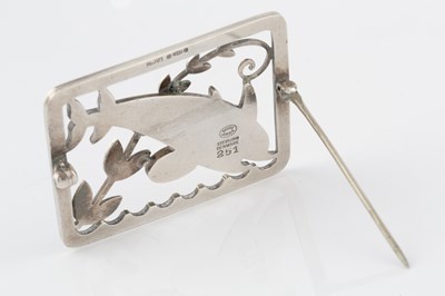 Lot 223 - A silver panel brooch designed by Arno...