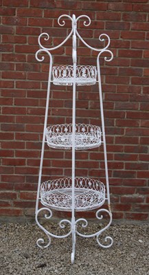 Lot 1416 - A three-tier white-painted wirework plant stand