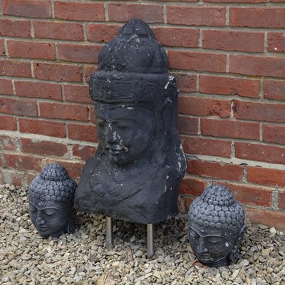 Lot 1407 - Three cast stone Buddha heads