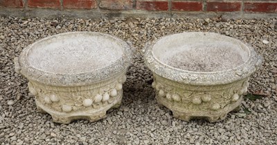 Lot 1441 - A pair of cast reconstituted stone willow stone planters