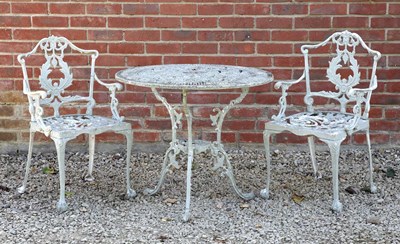 Lot 1385 - A cast aluminium bistro garden set