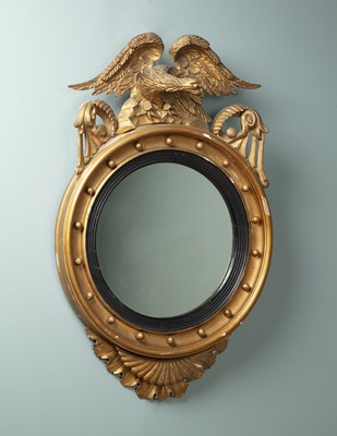 Lot 62 - A 19th century gold-painted circular wall mirror