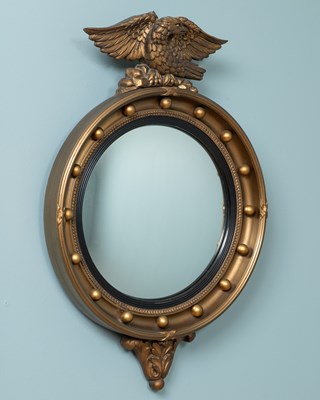 Lot 153 - A circular gold-painted convex wall mirror