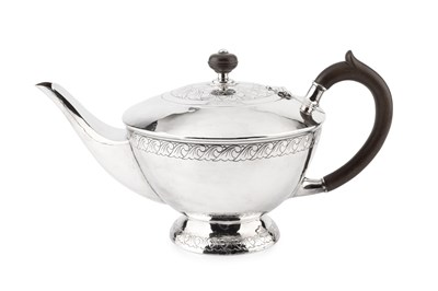 Lot 705 - A George V silver teapot, of circular domed...