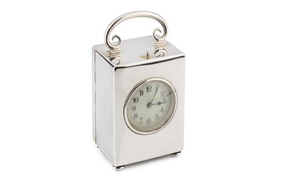 Lot 706 - An Edwardian silver carriage clock, having...