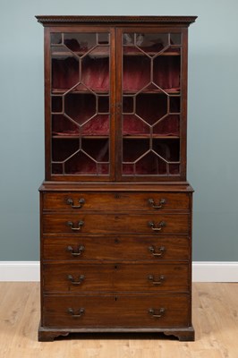 Lot 90 - An early 19th century mahogany secretaire bookcase