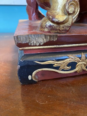 Lot 537 - A Chinese carved gilt and painted sculpture stand