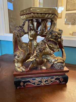 Lot 537 - A Chinese carved gilt and painted sculpture stand