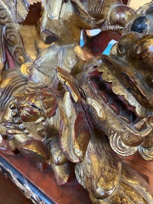 Lot 537 - A Chinese carved gilt and painted sculpture stand