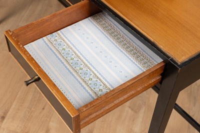 Lot 1044 - A Loughborough Furniture for Heal's black tan teak dressing table