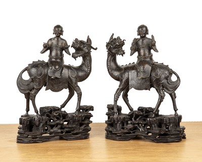 Lot Pair of bronze model Qilins and riders Chinese,...