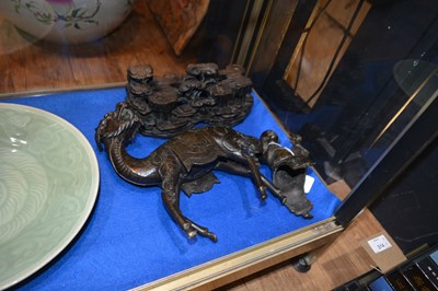 Lot 451 - Pair of bronze model Qilins and riders Chinese,...