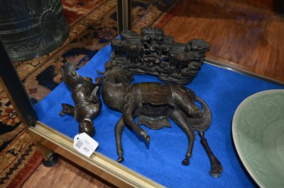 Lot 451 - Pair of bronze model Qilins and riders Chinese,...