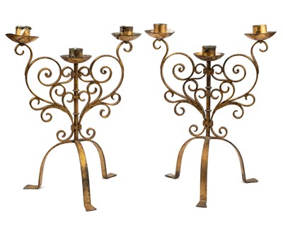 Lot 255 - A pair of gold-painted iron candelabra