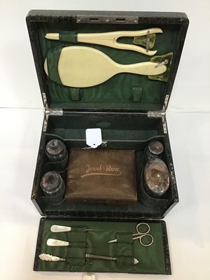 Lot 340 - A late Victorian crocodile leather toilet box,...