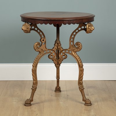 Lot 1410 - A cast iron gold-painted Coalbrookdale occasional table