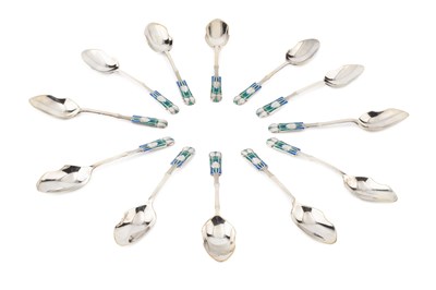 Lot 635 - A set of twelve George V silver and enamel...
