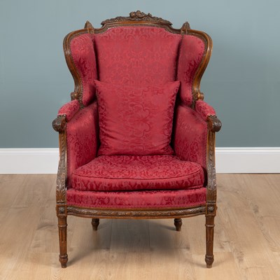 Lot 60 - A late 19th century French wingback armchair