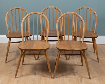 Lot 532 - A set of five Ercol light elm kitchen chairs