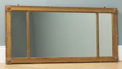 Lot 387 - A 19th century gilded triple-glass wall mirror