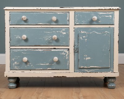 Lot 533 - A blue and white-painted pine cabinet