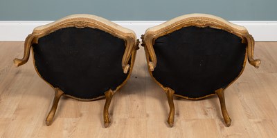 Lot 133 - A pair of Louis XV French gilt-framed elbow chairs