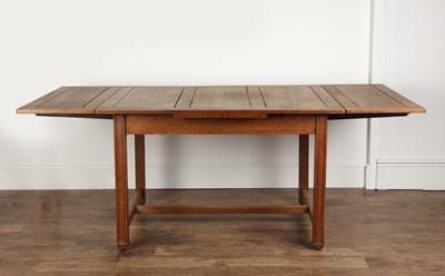 Lot 76 - Heals oak, draw-leaf dining table, with...