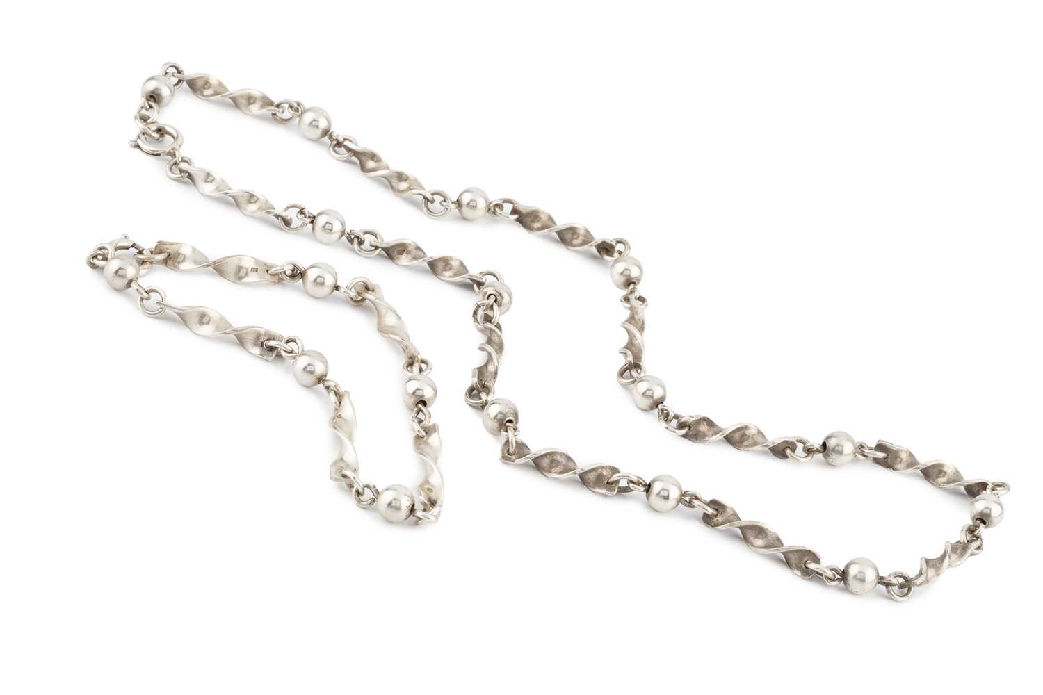 Lot 219 - A silver fancy-link necklace by Anthony...