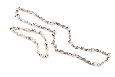 Lot 219 - A silver fancy-link necklace by Anthony...