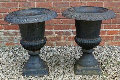 Lot 1344 - A pair of Victorian cast iron urns