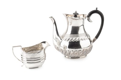 Lot 741 - An Edwardian silver coffee pot, with reeded...