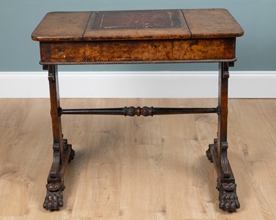 Lot 287 - A George IV pollard oak writing table attributed to Gillows